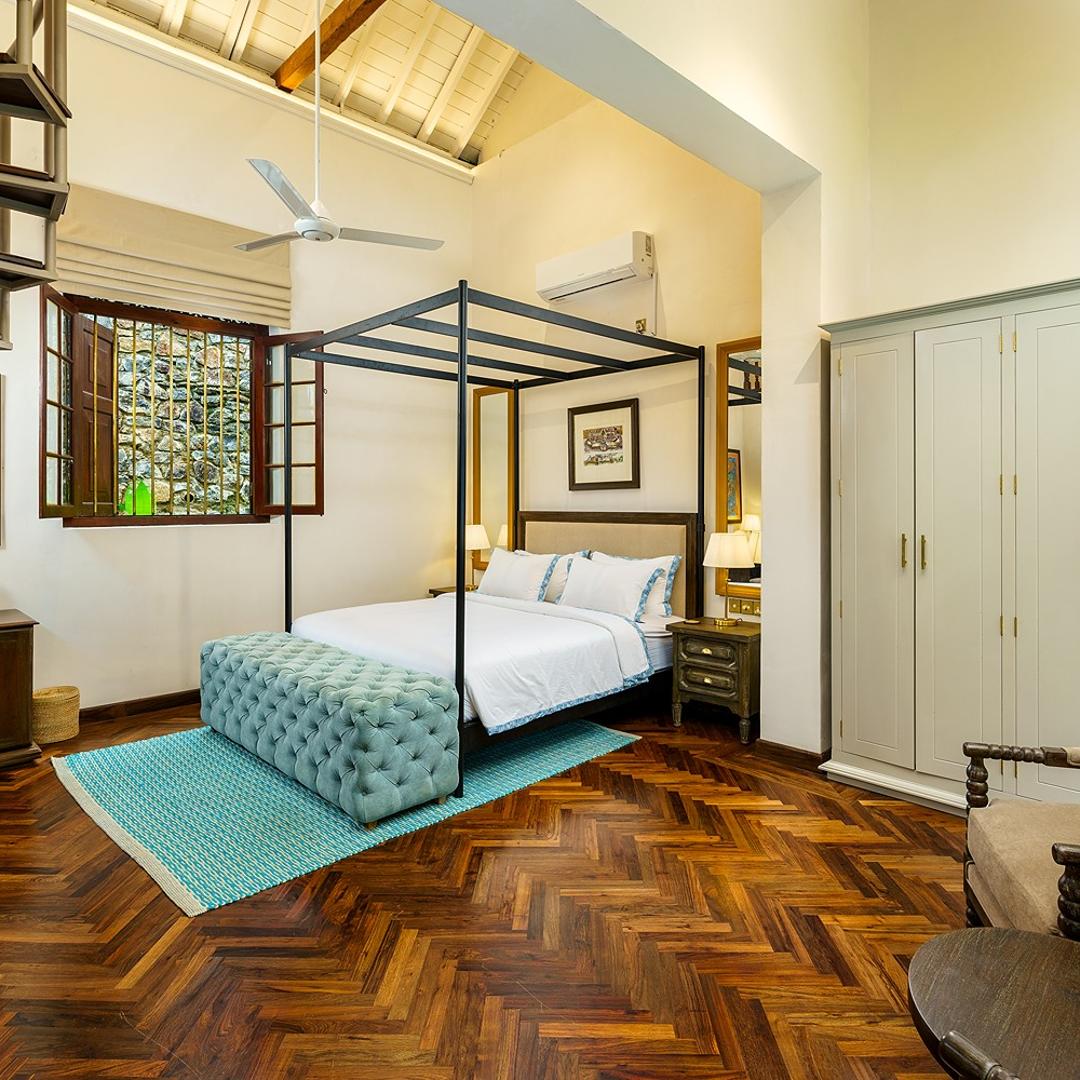 Elliot House Ebony Suite with four-poster bed and dark timber finishes in Galle