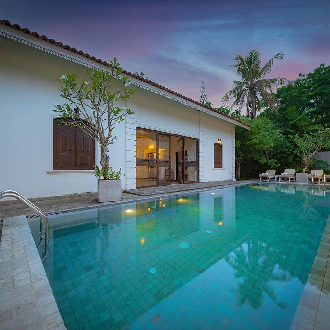 Pichcha Ahangama pool at evening with facade reflection