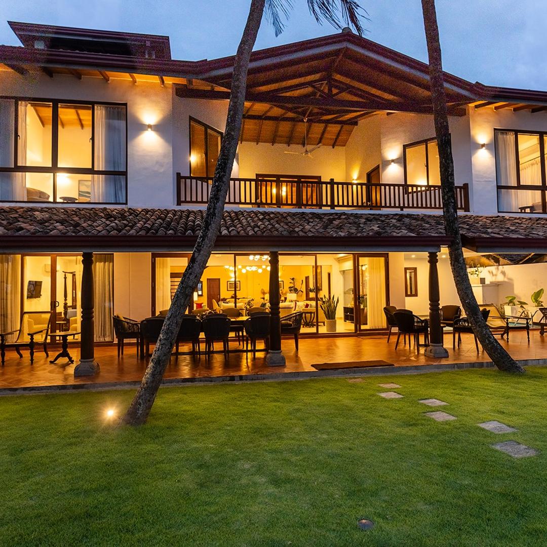 Pool and facade at dusk at The Beach Home Rillamba, Hikkaduwa, Sri Lanka