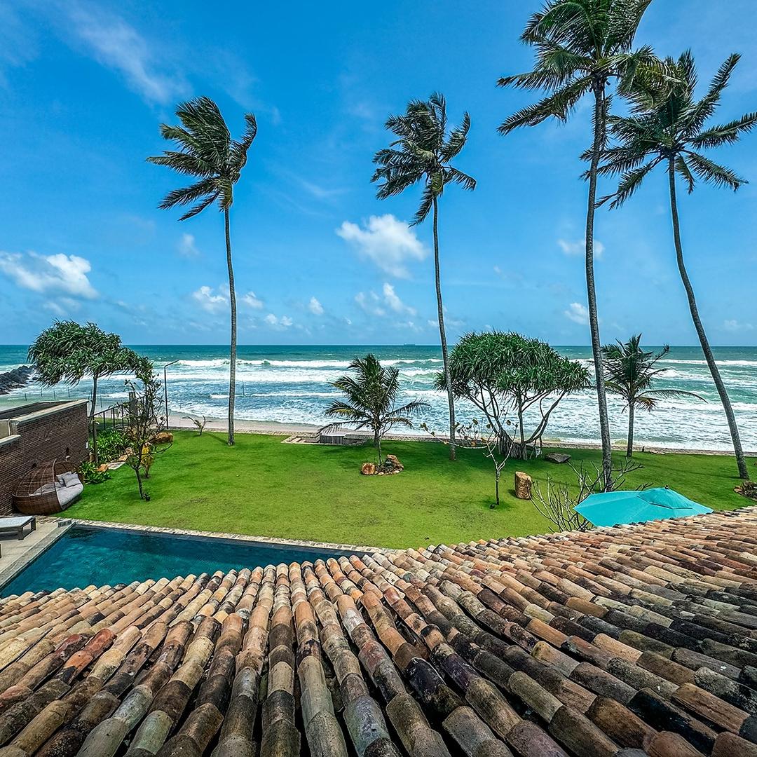 Pool and beach palm view, Candella House Talpe