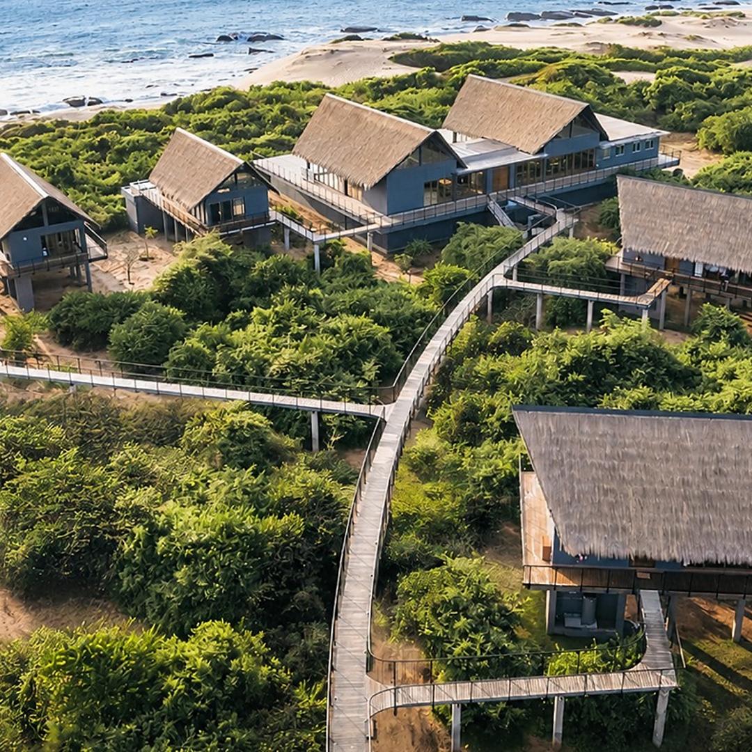 Aerial villa ocean and forest wide, Kotiyagala Yala