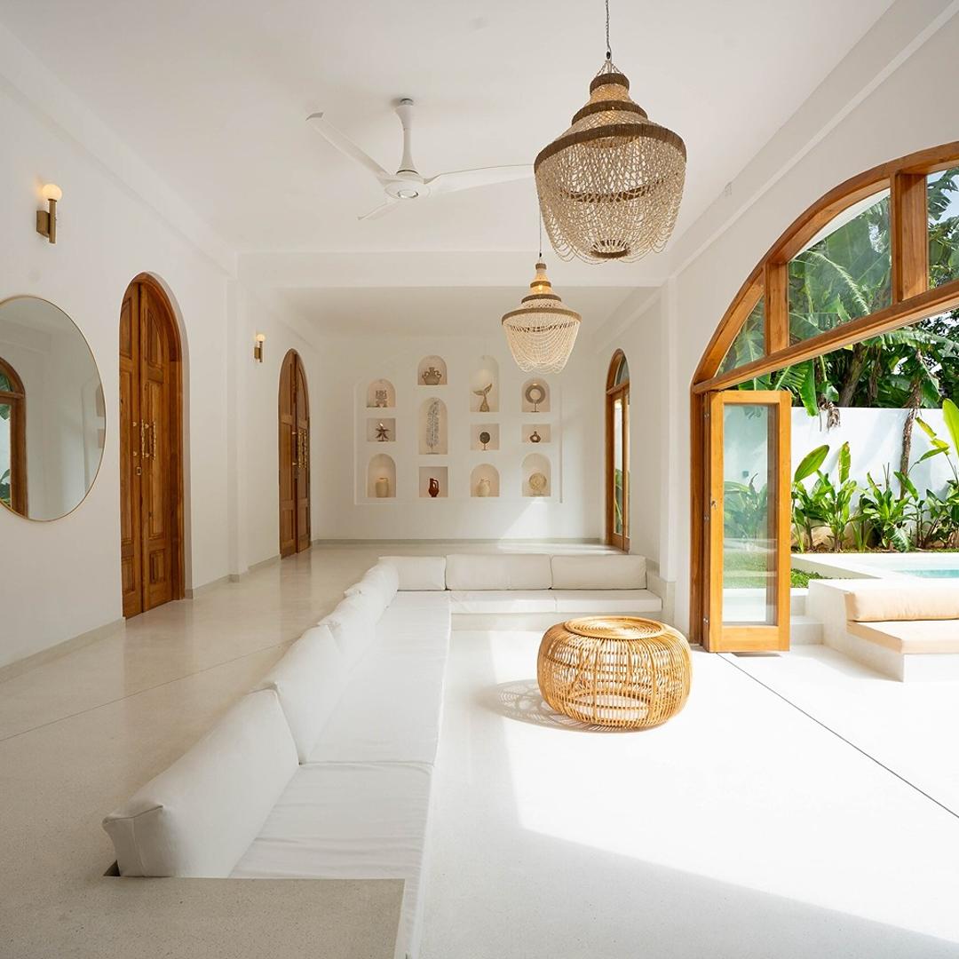 Arco House Ahangama living room with arches and pool view