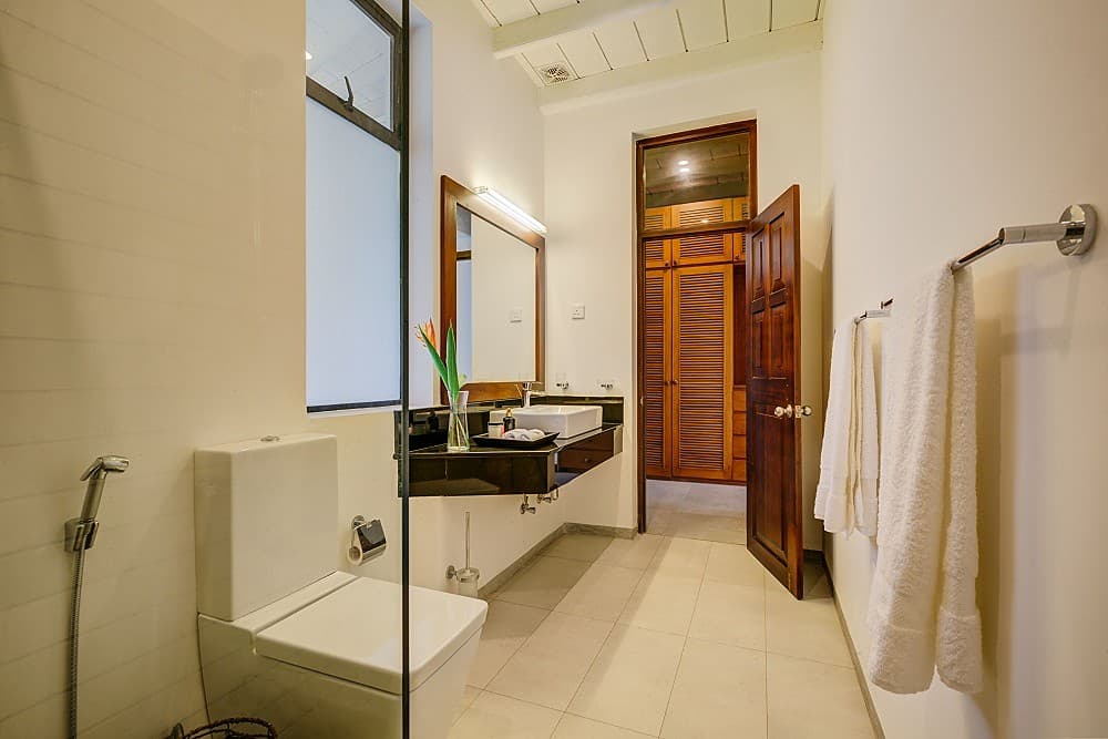 Villa bathroom with clean minimal design and modern fixtures in Sri Lanka