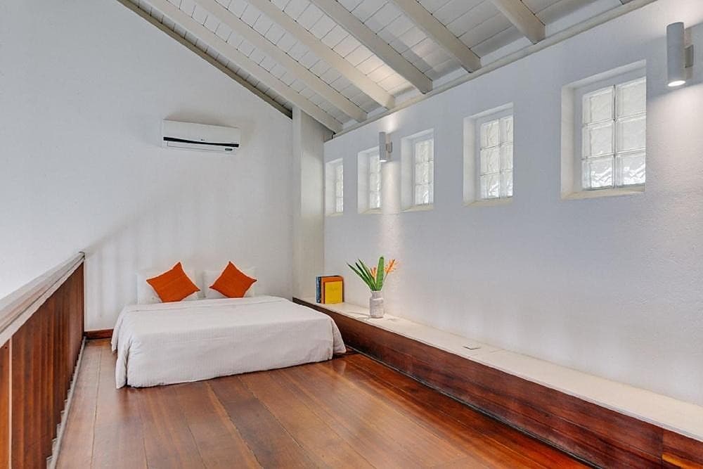 Villa loft-style bedroom providing extra sleeping space with natural ventilation