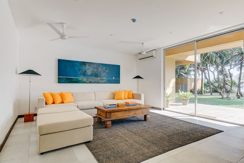 Villa lounge with smart TV, contemporary seating and air conditioning in Wadduwa