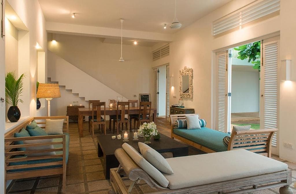 Sri Villas Induruwa open-plan interior with dining area and direct ocean views