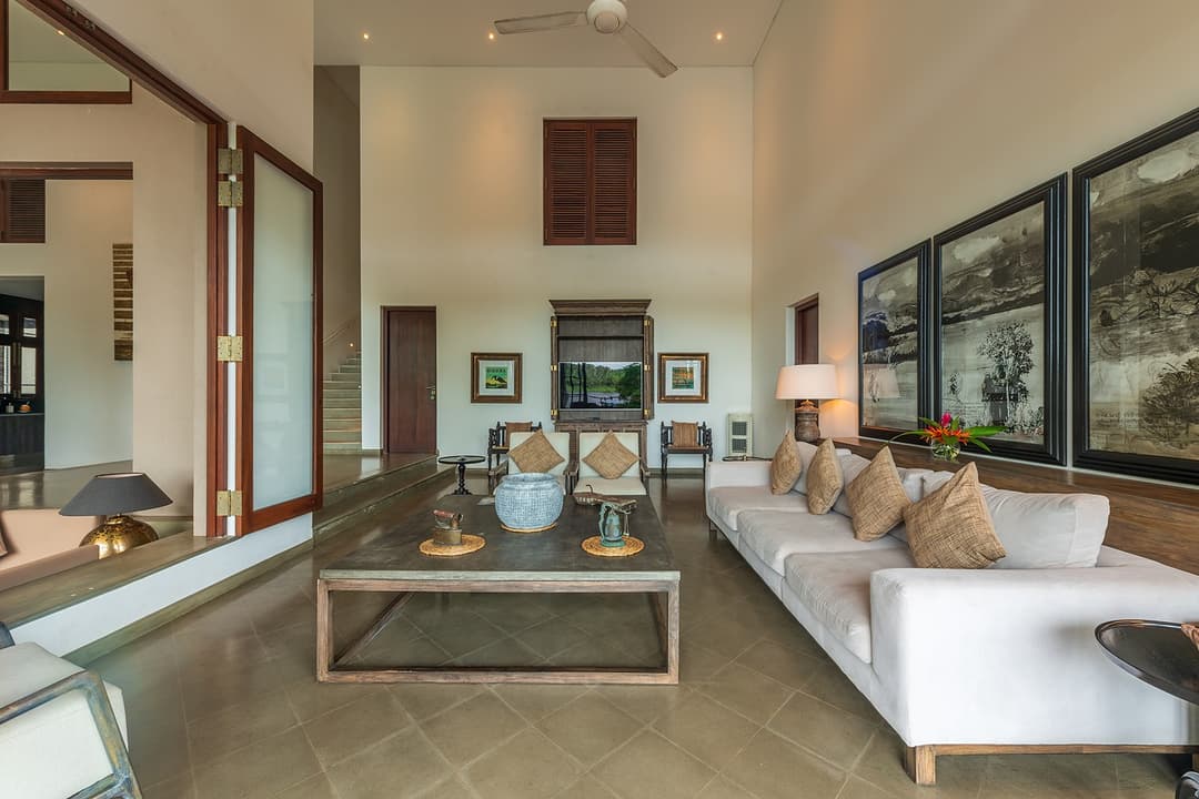 Bolgoda Lake villa open-plan interior lounge with large windows and lake views