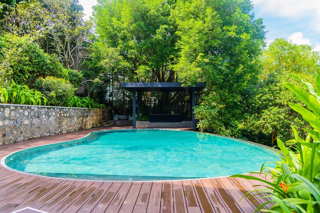 Celeste Bolgoda lagoon pool with lush garden and mature tropical trees
