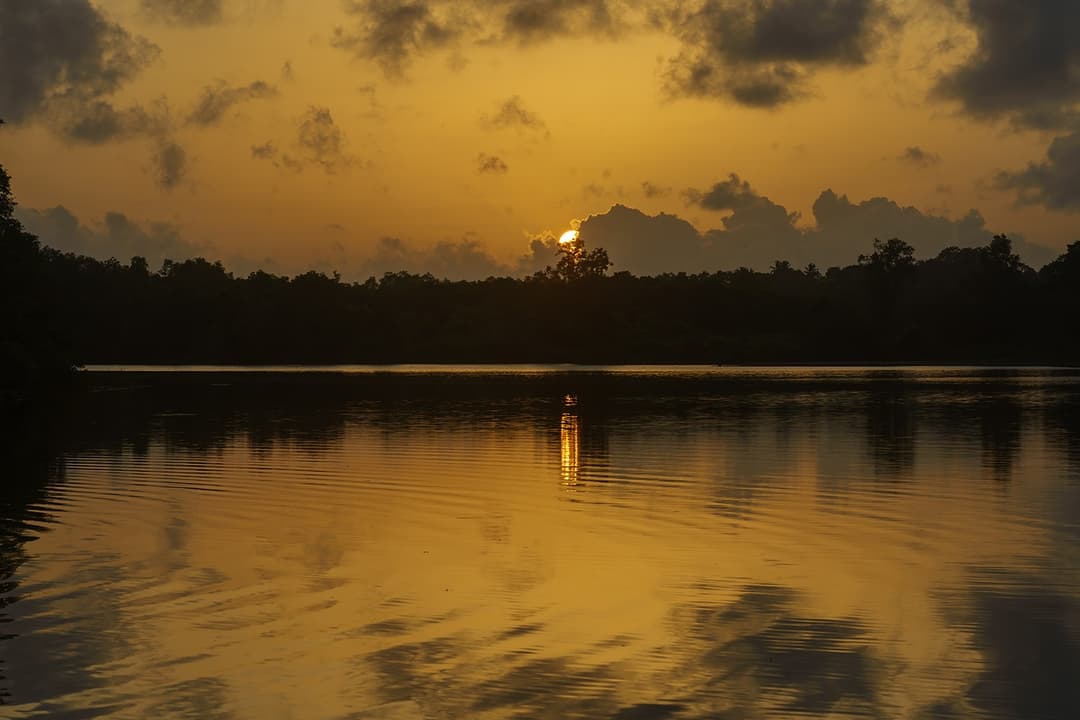 Celeste Bolgoda dramatic golden hour sunset reflected on the still lake waters