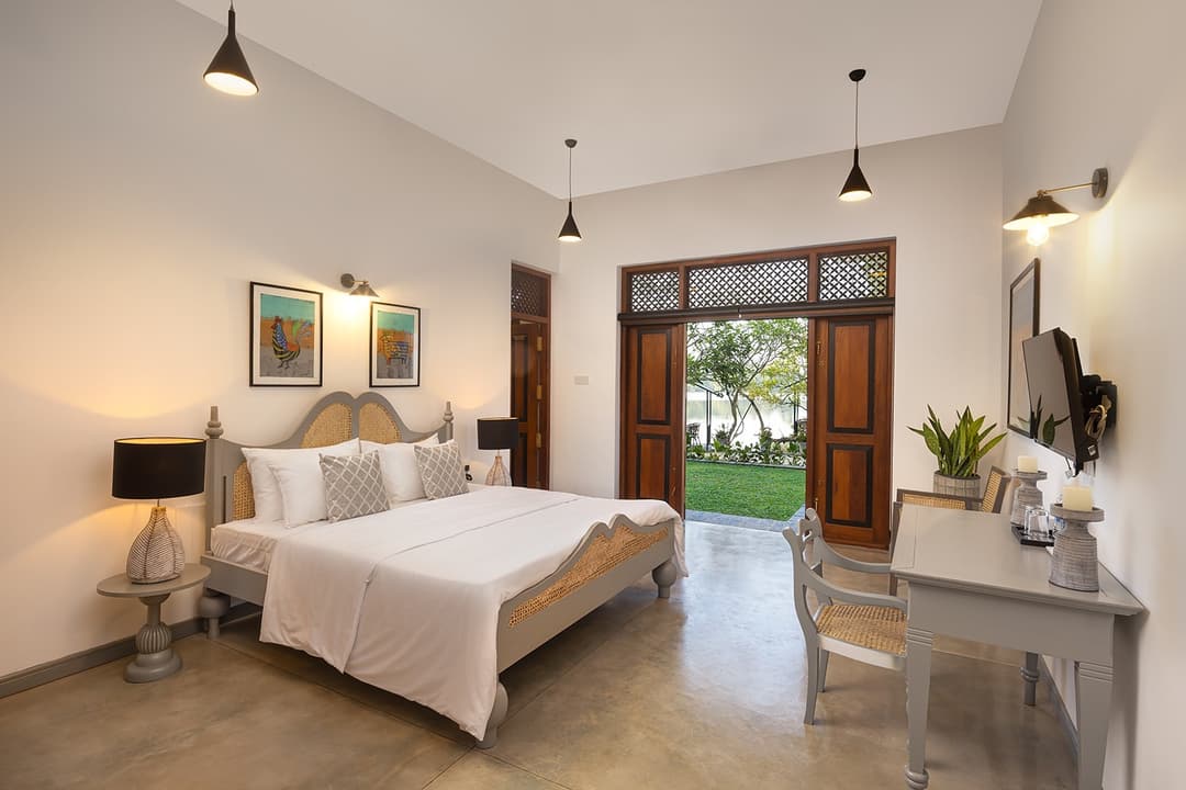 Architect-designed villa bedroom with king bed and natural light in Bentota