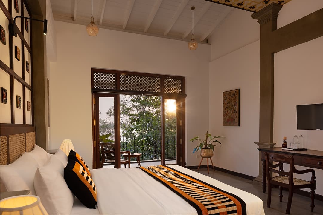 Overhead detail of villa bedroom with hand-painted ornamental ceiling in Bentota