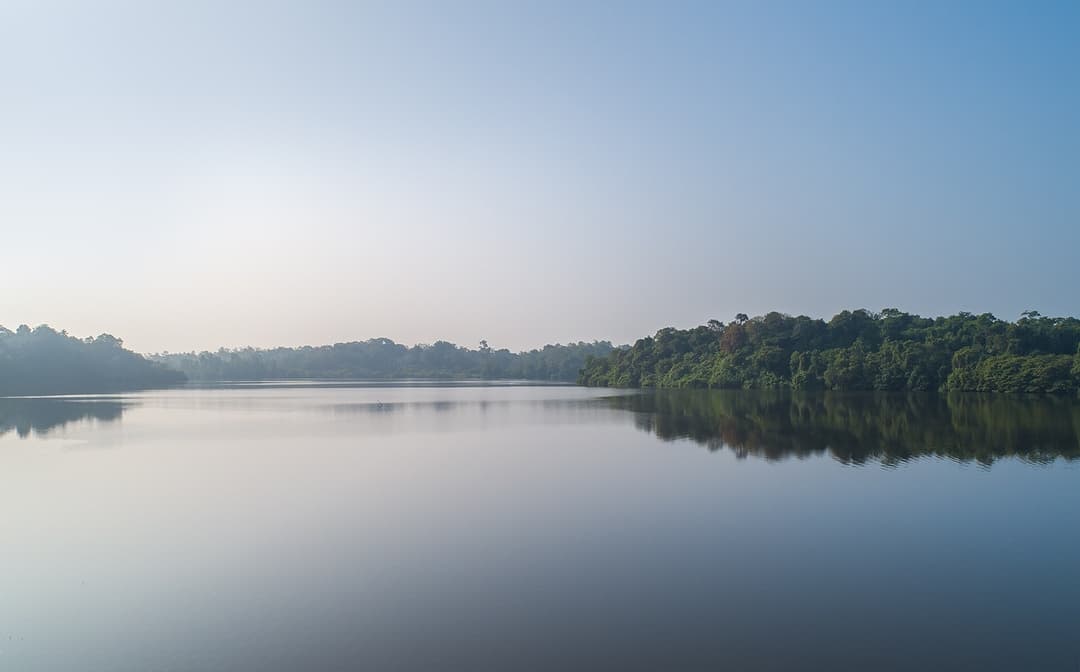 Dawn calm water reflection on Dedduwa Lake at Yahva Bentota Sri Lanka
