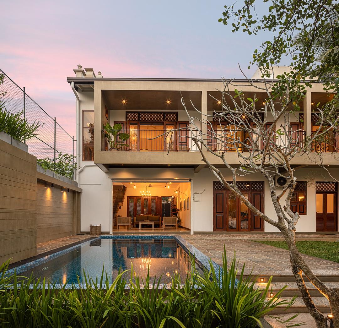 Yahva Bentota villa exterior and pool terrace photographed at dusk