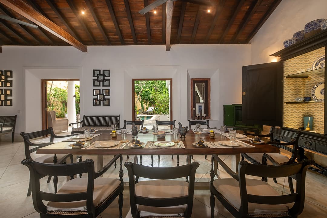 32 Middle Street Galle dining room with dark timber ceiling and arched colonial doors