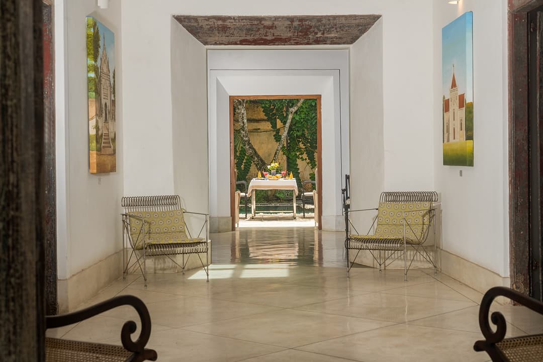 32 Middle Street Galle Fort entrance corridor with colonial arch and artwork