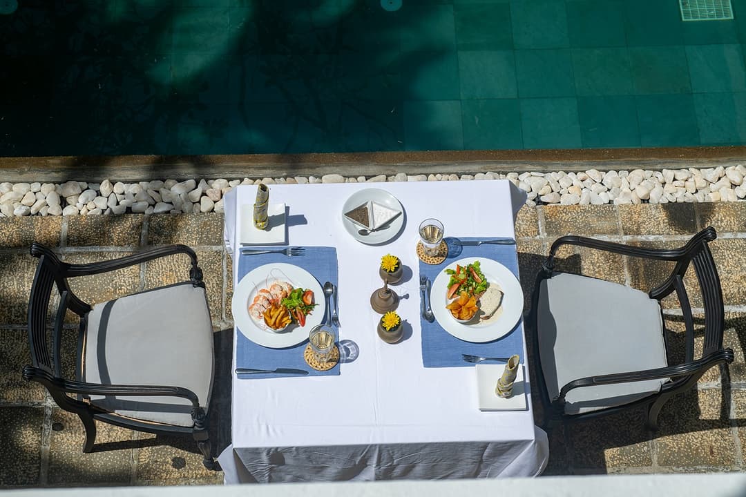 32 Middle Street Galle Fort pool and outdoor dining table from above with blue tableware