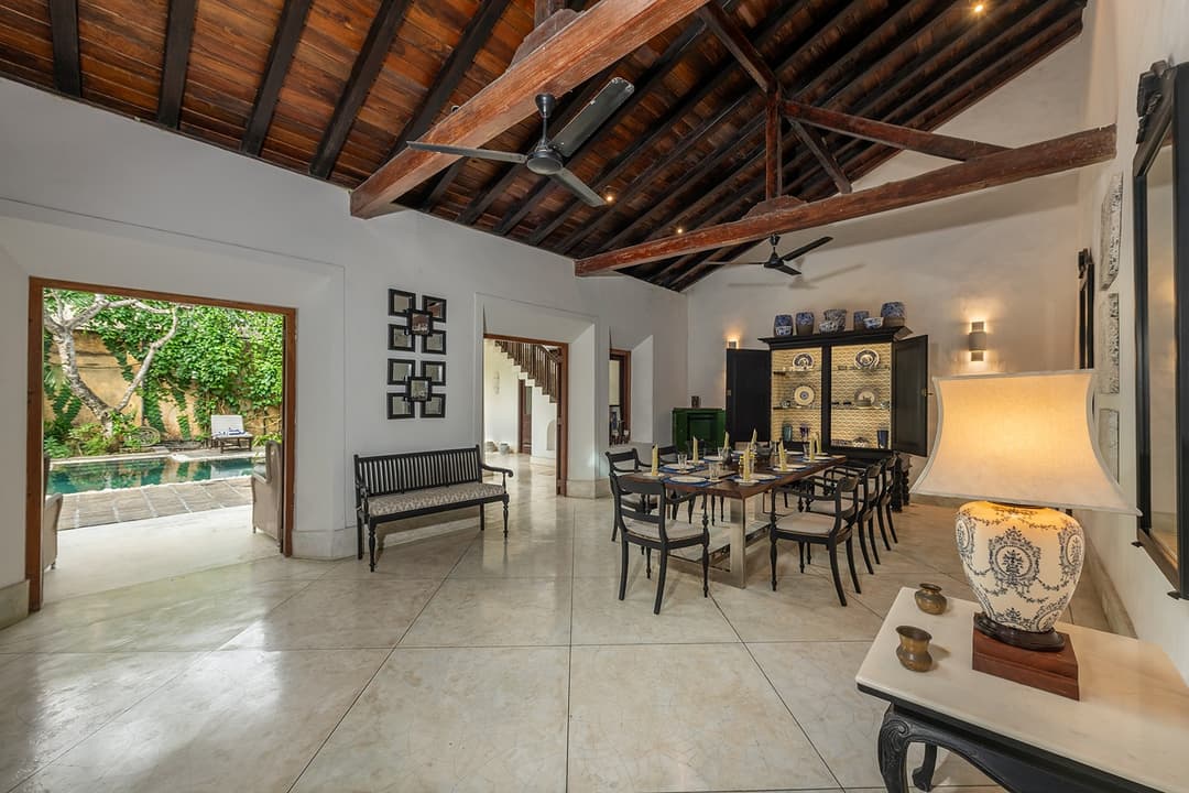 Villa open living room with timber beamed ceiling and direct garden access in Galle Fort