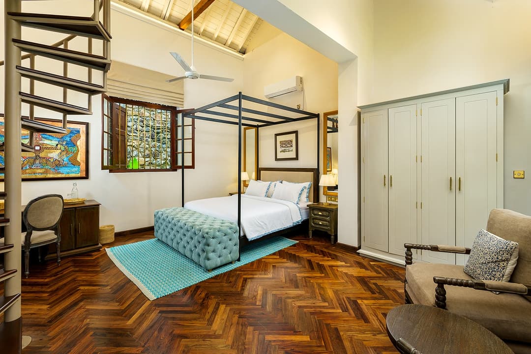 Elliot House Ebony Suite with four-poster bed and dark timber finishes in Galle