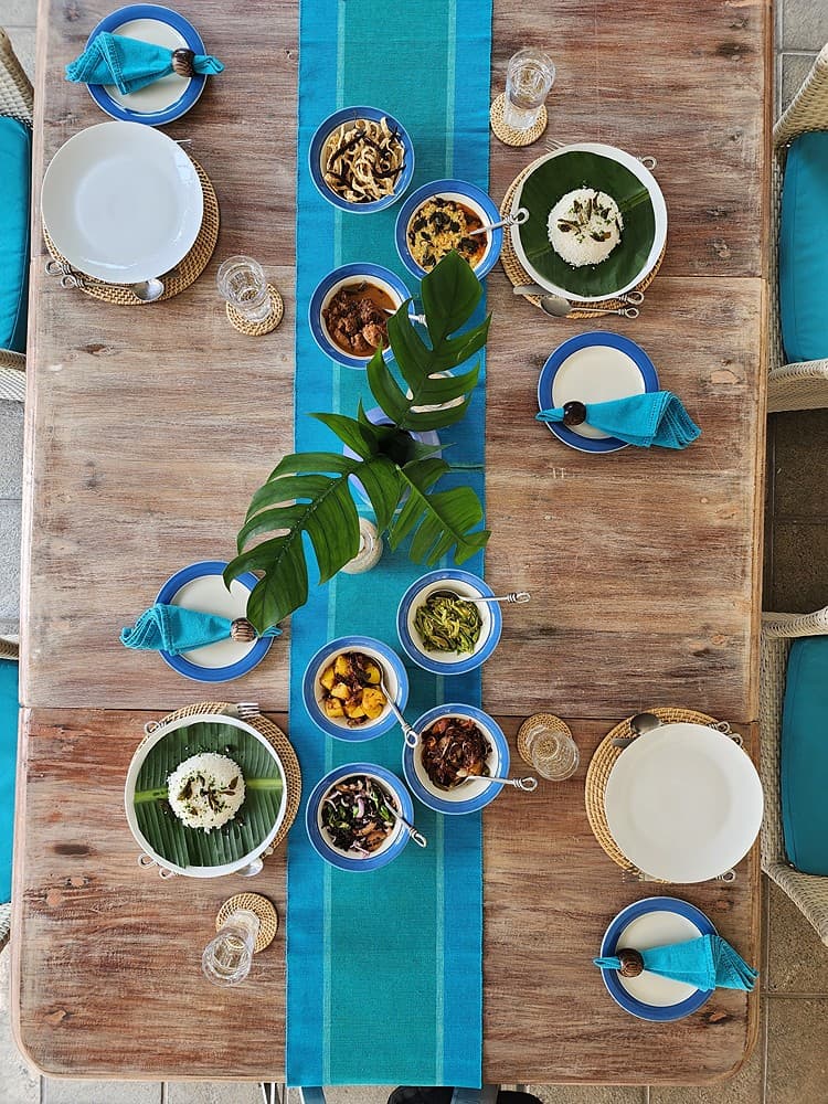Overhead villa dining table with lunch spread and blue runner at Unawatuna Sri Lanka