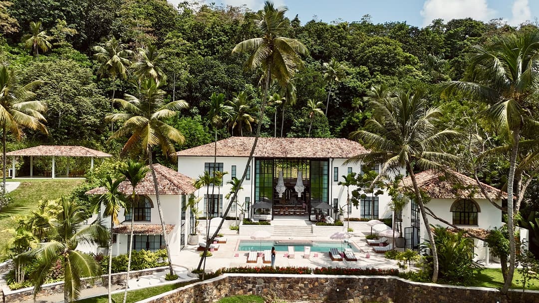 Miss Ceylon Unawatuna aerial view of hotel pool and tropical gardens daytime