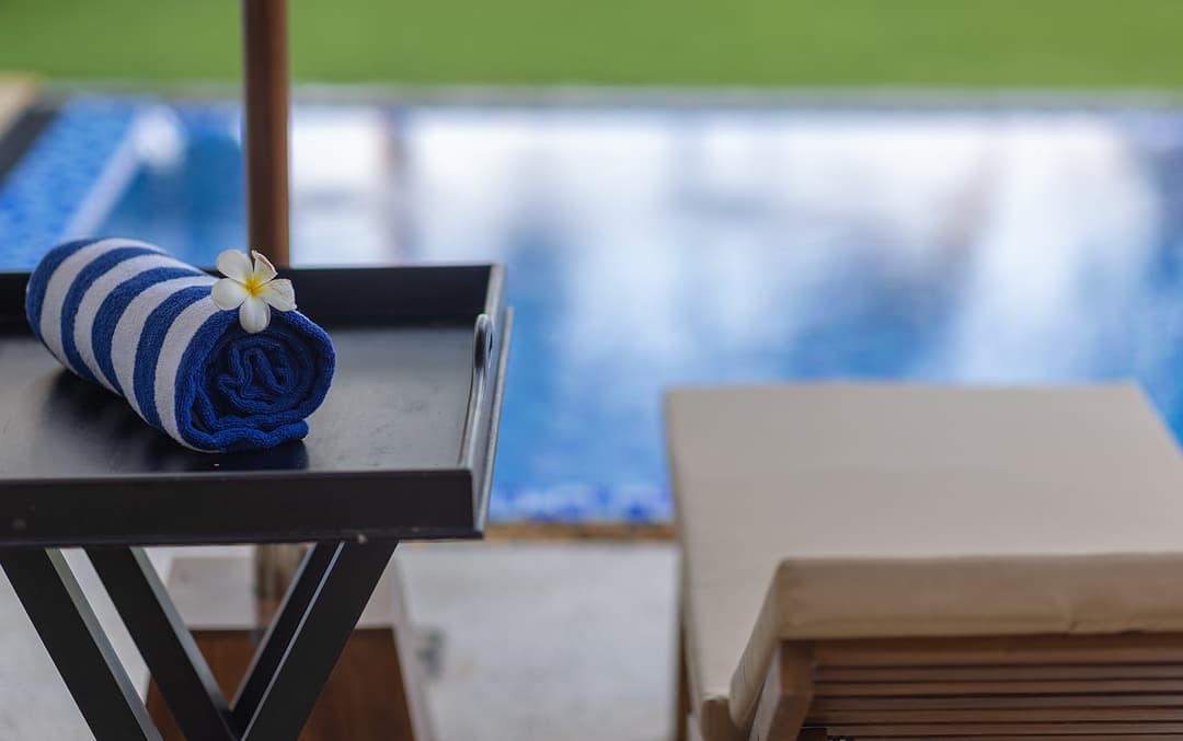 Ahangama beachfront villa pool with pool towel and sun loungers