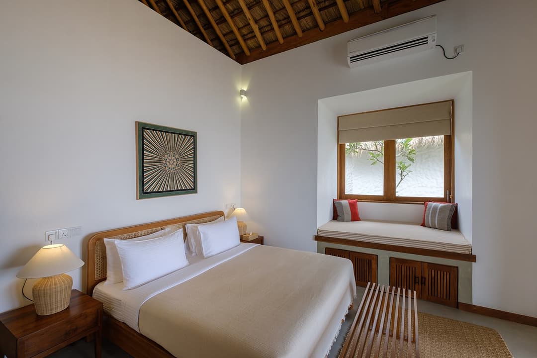 Mirissa villa bedroom with king bed, AC and window natural light