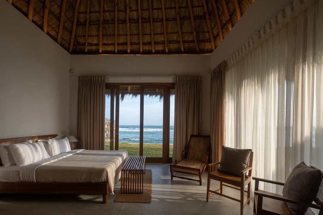 Mirissa villa master bedroom with wide ocean view and thatched ceiling