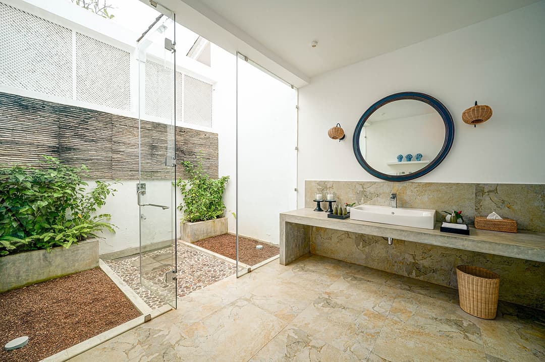 Mirissa luxury villa open air bathroom with stone basin and tropical garden