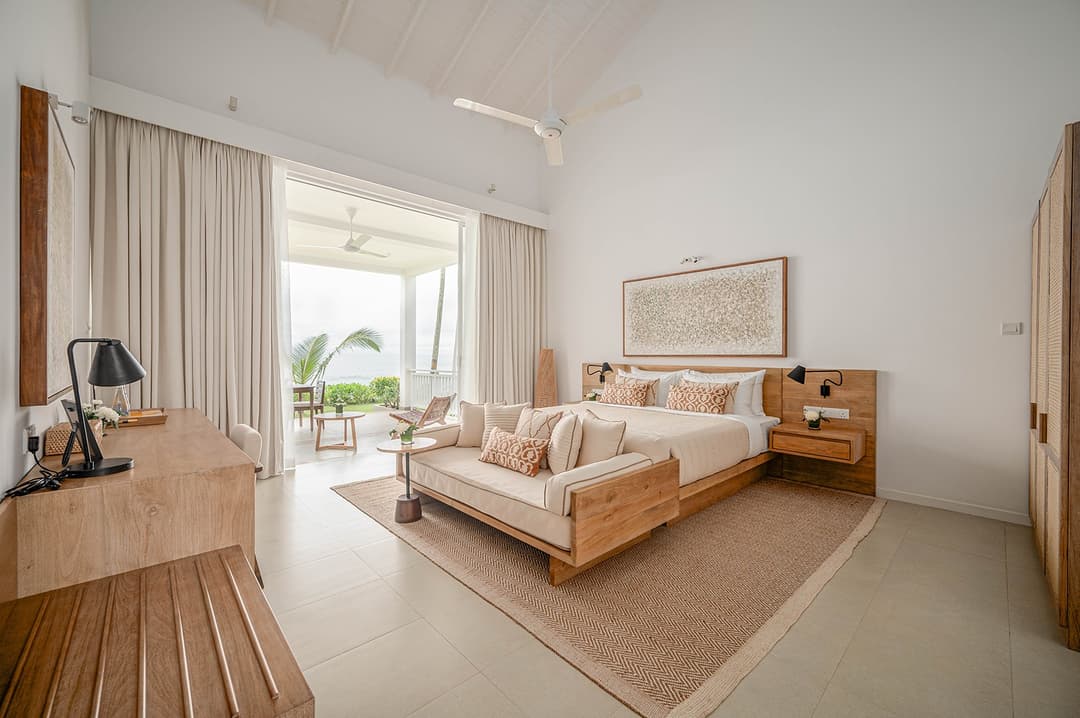Mirissa luxury villa bedroom with king rattan headboard wide and natural light