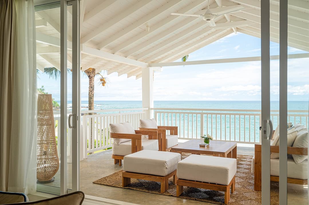 Mirissa luxury villa ocean terrace with daybed and white balustrade view