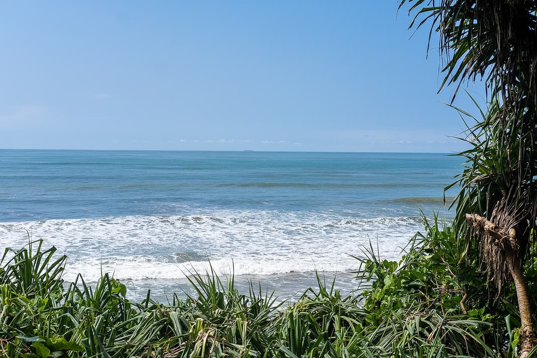 Matara beach villa ocean view with surf waves and coastal garden