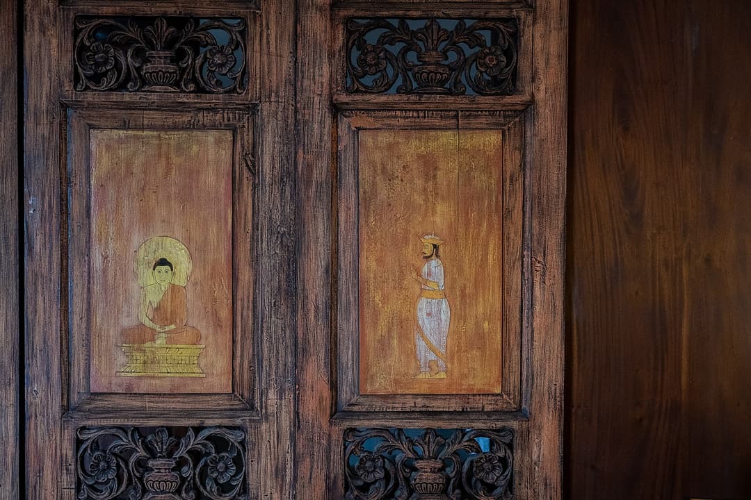 Matara villa antique carved timber doors with Sri Lankan artwork panels