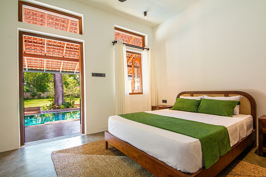 Villa bathroom with towel ladder and natural light