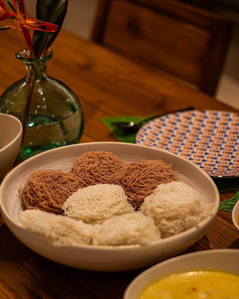 Traditional Sri Lankan string hoppers spread served family style