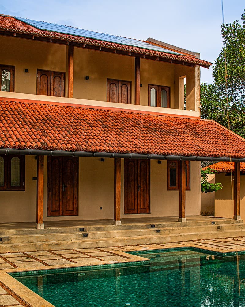 Origin Balapitiya master bedroom with king bed and ensuite access