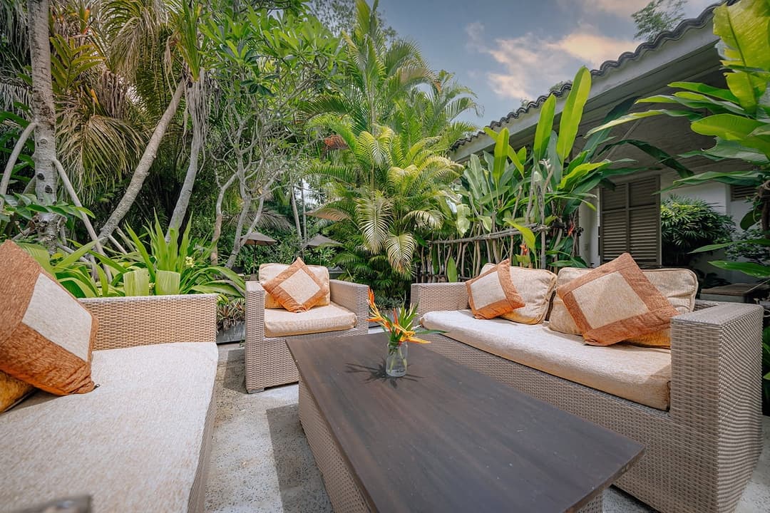 Rivers Edge outdoor lounge with cushions and garden view