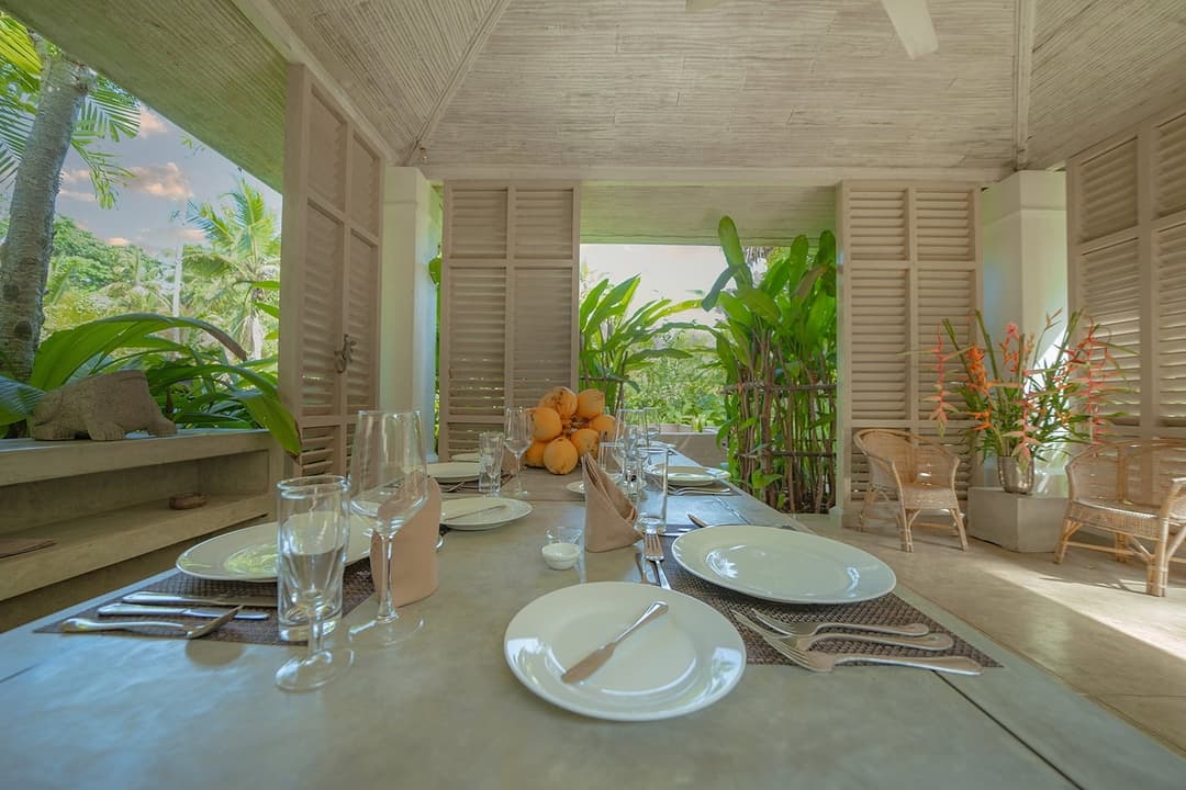 Rivers Edge outdoor dining table on pool terrace