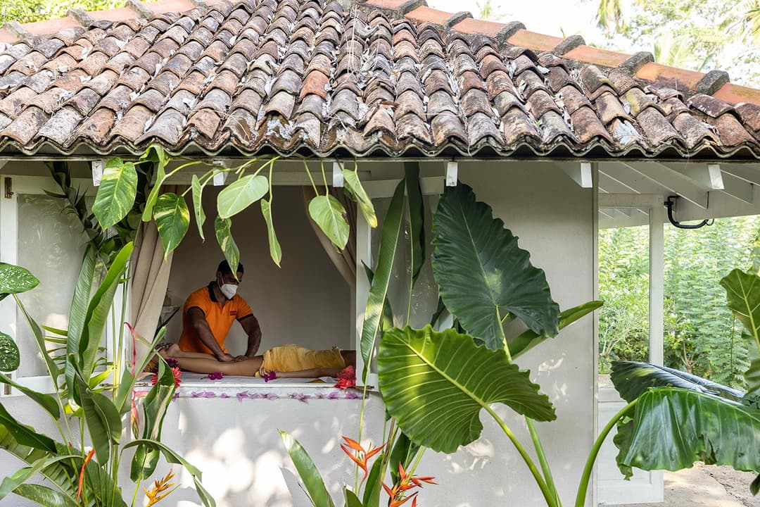 Spa massage treatment at boutique hotel wellness pavilion