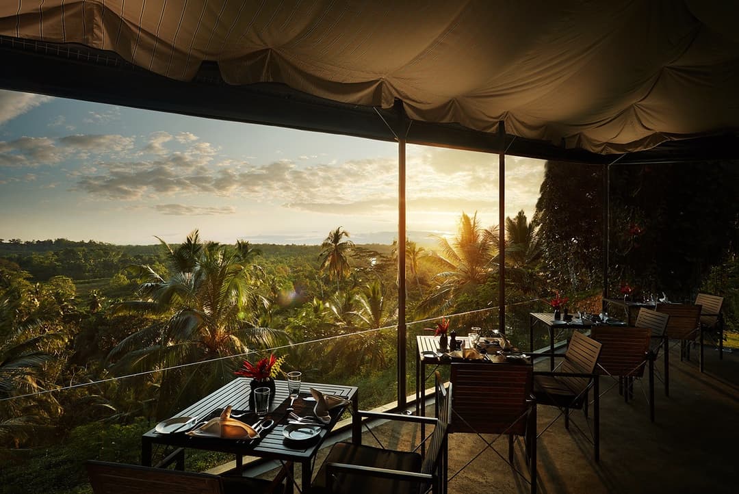 Kahanda Kanda dining pavilion at sunset golden hour