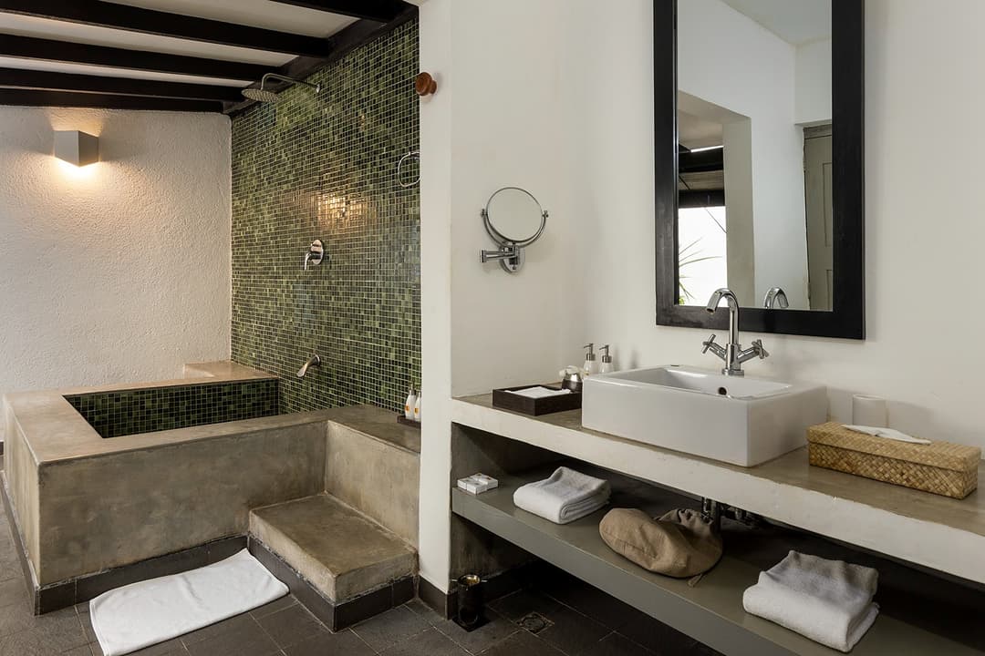 Clean stone bathroom with quality fixtures at Heritage House Bentota, Bentota, Sri Lanka