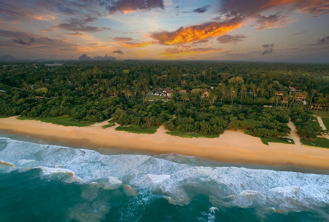 Aerial view of Bentota beach coastline adjacent to Heritage House, southern Sri Lanka
