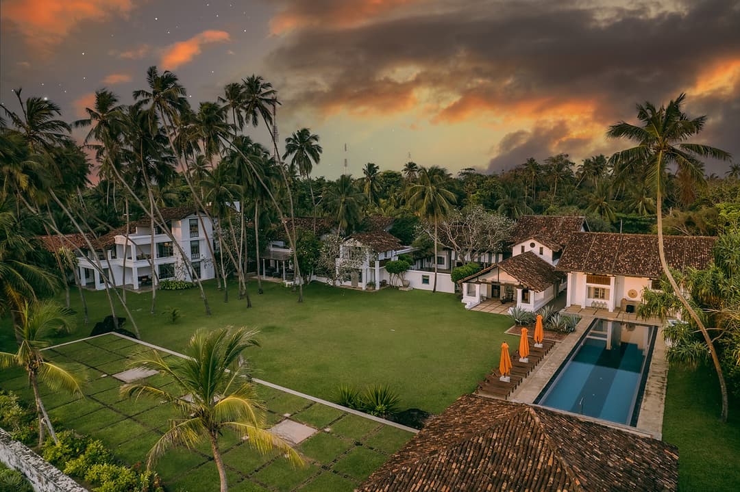 Wide aerial overview of Heritage House Bentota showing beachfront location and estate grounds