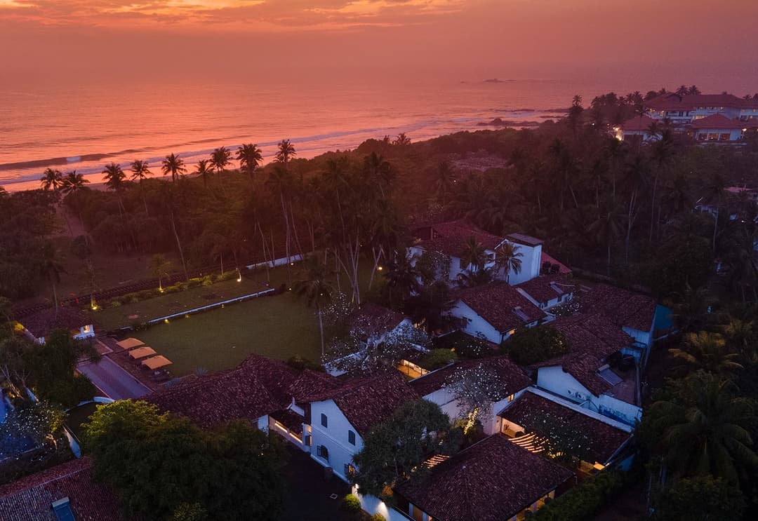 Wide aerial overview of Heritage House Bentota showing beachfront location and estate grounds