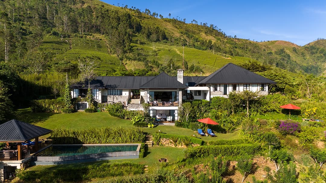 Close aerial of Camellia Hills bungalow surrounded by tea estates, Dickoya, Sri Lanka
