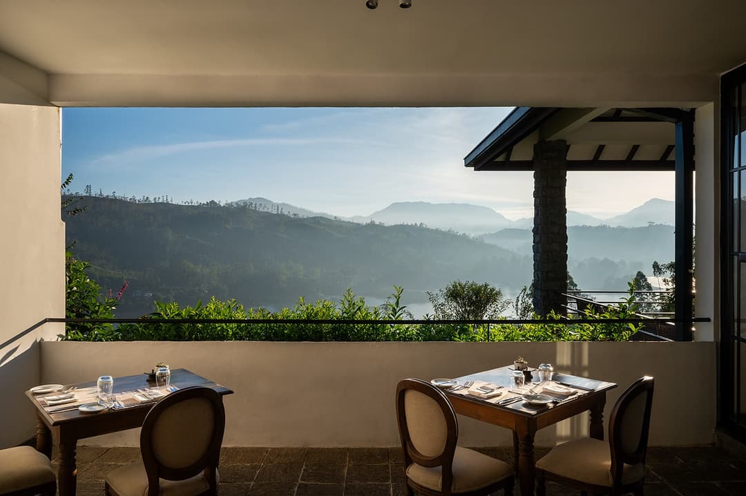Camellia Hills alfresco dining terrace with mountain valley views, Dickoya, Sri Lanka