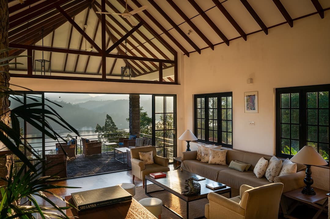 Open-plan lounge with full valley views at Camellia Hills, Dickoya, Sri Lanka