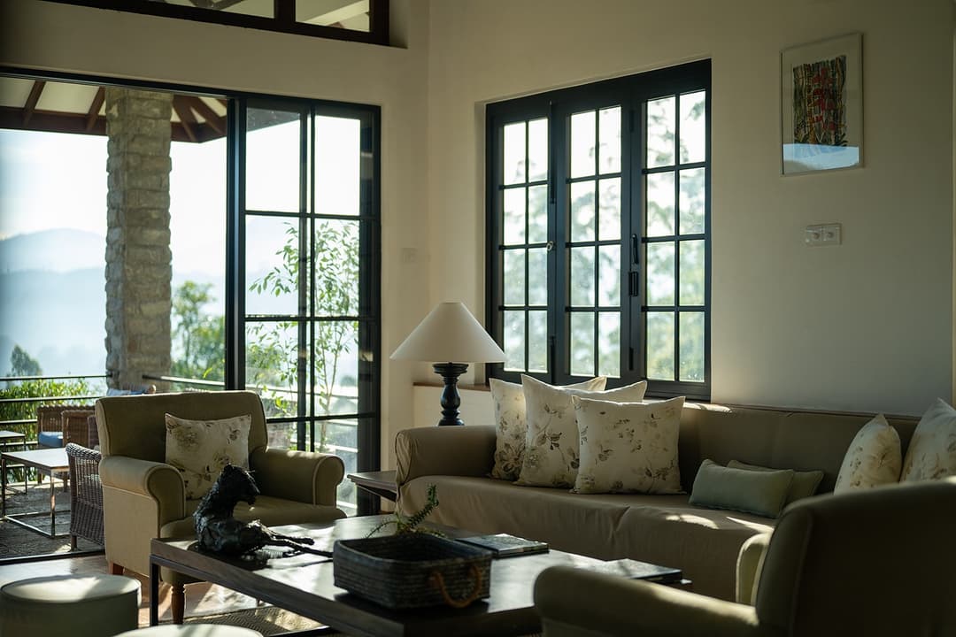 Camellia Hills lounge with sofa seating and mountain views, Dickoya, Sri Lanka