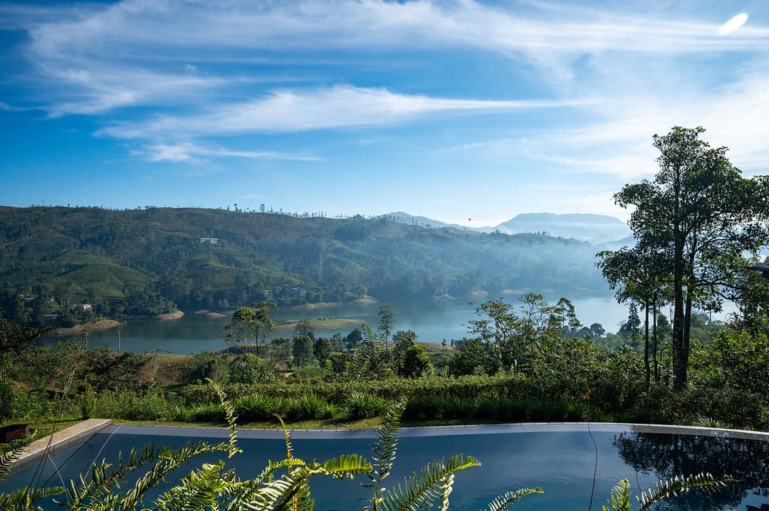 Camellia Hills pool with Castlereagh Reservoir reflection and hills beyond, Dickoya