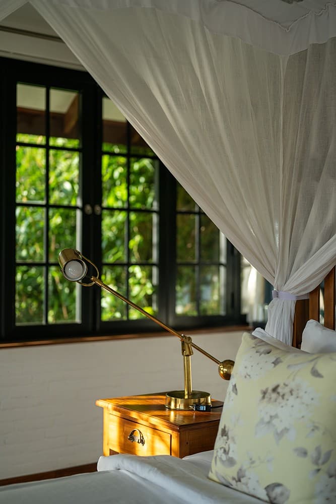 Dickoya suite window with framed tea hill views at Camellia Hills, Dickoya, Sri Lanka