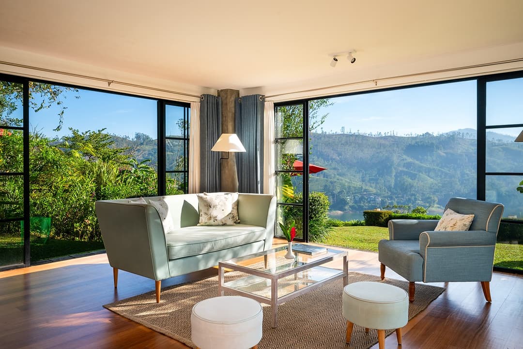 Warleigh suite wide living area with floor-to-ceiling mountain views, Camellia Hills